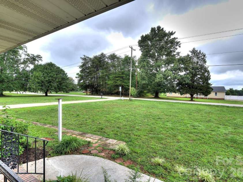 1195 Holly Springs Road, Lyman, SC 29365.  MLS# CAR4387941, YatesRealty ID 26730. View from front porch