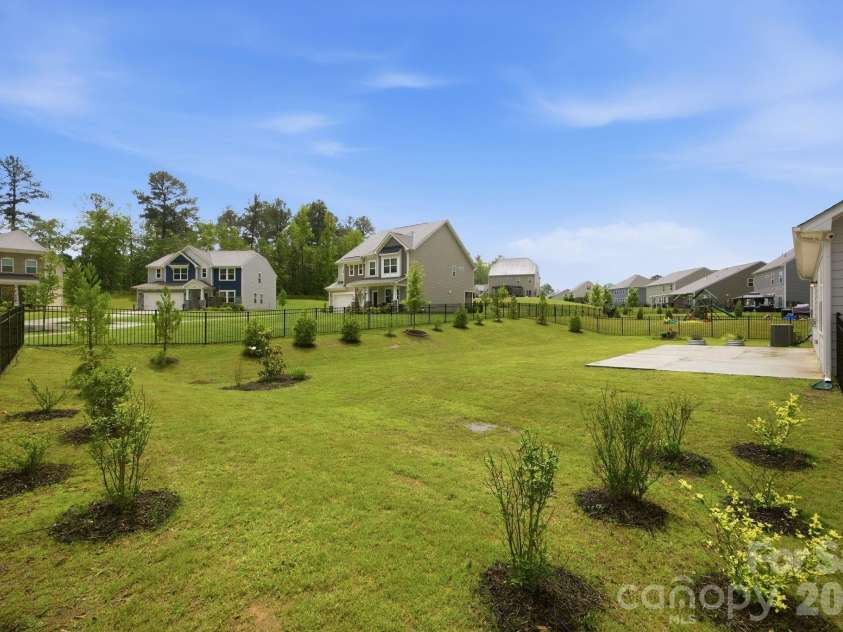 234 Hamptons Cove Road, Troutman, NC 28166.  MLS# CAR4386490, YatesRealty ID 26733. Back Exterior