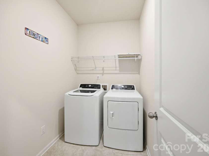 234 Hamptons Cove Road, Troutman, NC 28166.  MLS# CAR4386490, YatesRealty ID 26733. Laundry