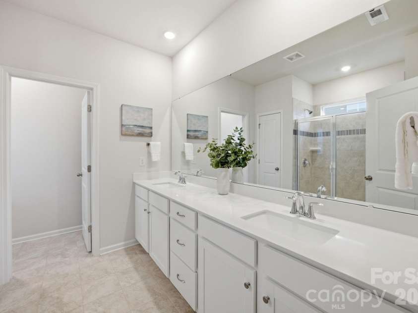 234 Hamptons Cove Road, Troutman, NC 28166.  MLS# CAR4386490, YatesRealty ID 26733. Primary Bathroom on Main