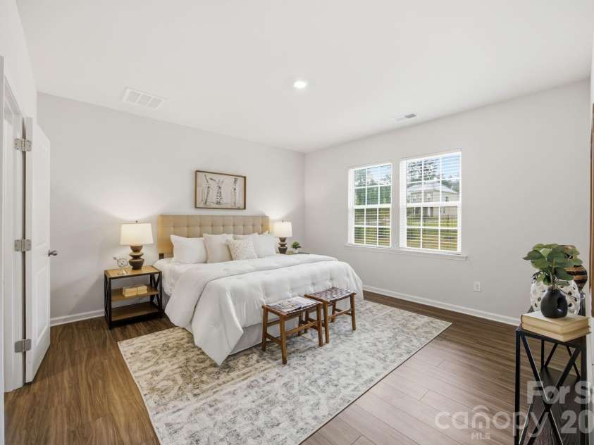234 Hamptons Cove Road, Troutman, NC 28166.  MLS# CAR4386490, YatesRealty ID 26733. Primary Bedroom on Main