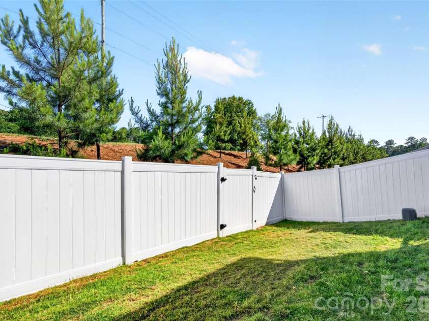 4192 Steel Way, Sherrills Ford, NC 28673.  MLS# CAR4383592, YatesRealty ID 26734. Access gate for lawn mower.