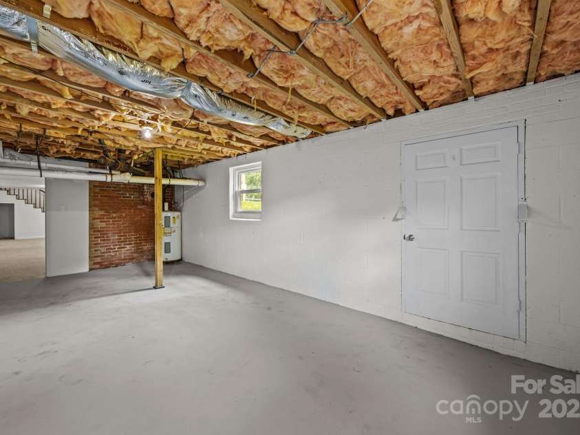 525 Julia Avenue, Belmont, NC 28012.  MLS# CAR4281678, YatesRealty ID 26734. Basement Storage room