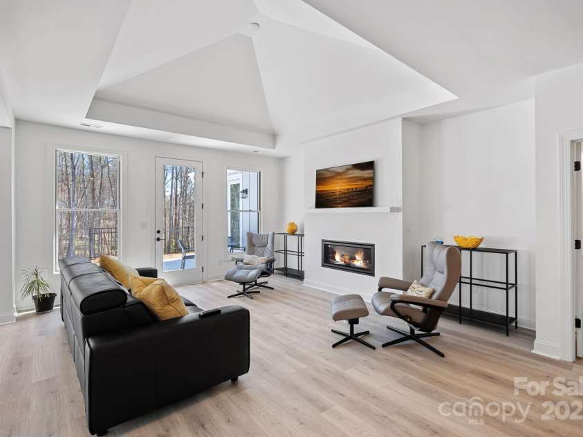 218 Alenda Lux Circle, Mooresville, NC 28115.  MLS# CAR4235396, YatesRealty ID 26739. LIVING ROOM WITH FIREPLACE