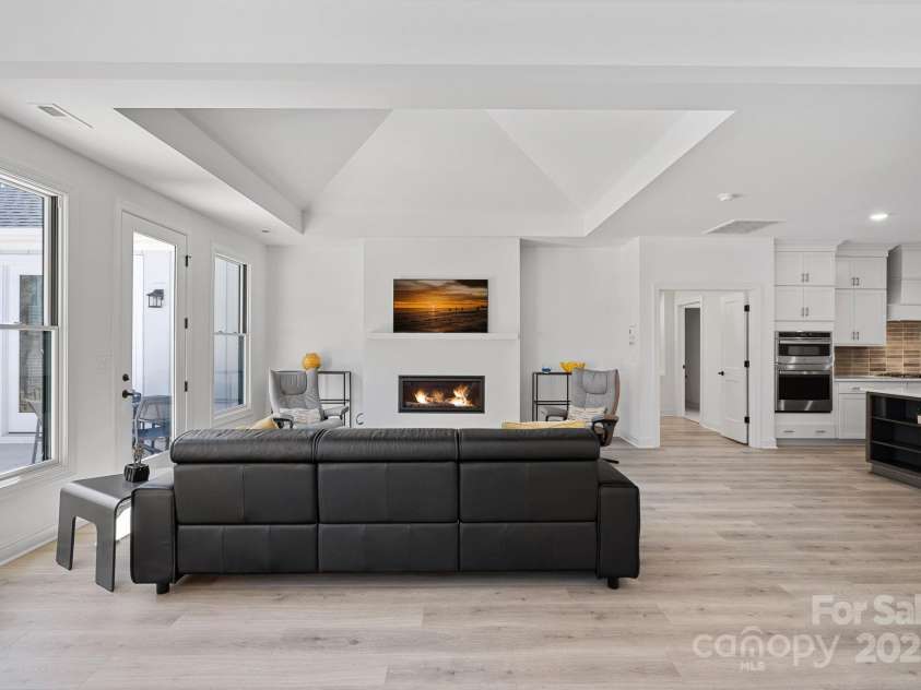 218 Alenda Lux Circle, Mooresville, NC 28115.  MLS# CAR4311950, YatesRealty ID 26739. FAMILY ROOM WITH UPGRADED CATHEDRAL CEILING