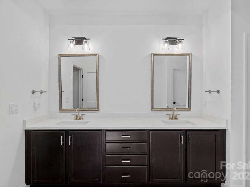 218 Alenda Lux Circle, Mooresville, NC 28115.  MLS# CAR4311950, YatesRealty ID 26739. VANITY IN PRIMARY BATHROOM
