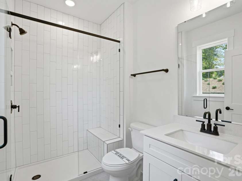 5076 McLaughlin Loop, Waxhaw, NC 28173.  MLS# CAR4334709, YatesRealty ID 26740. Guest Bath