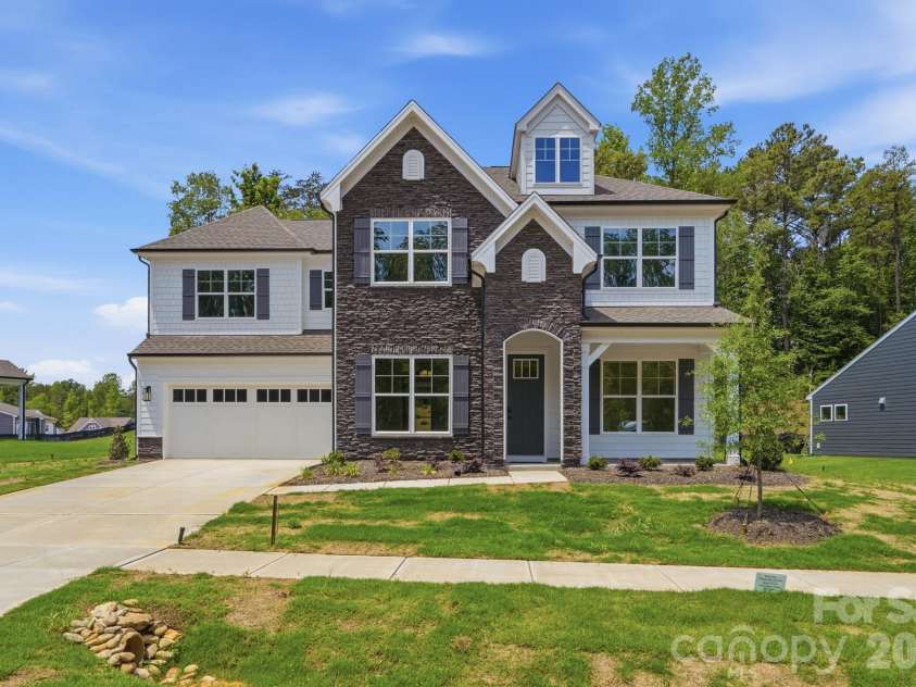5076 McLaughlin Loop, Waxhaw, NC 28173.  MLS# CAR4334709, YatesRealty ID 26740. Homesite 90 features a Colfax E floorplan