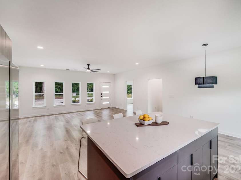 6907 Lancaster Highway, Waxhaw, NC 28173.  MLS# CAR4247480, YatesRealty ID 26742. The open-concept kitchen, dining, and great room layout creates a seamless space that’s ideal for entertaining family and friends, or simply enjoying comfortable, everyday living.
