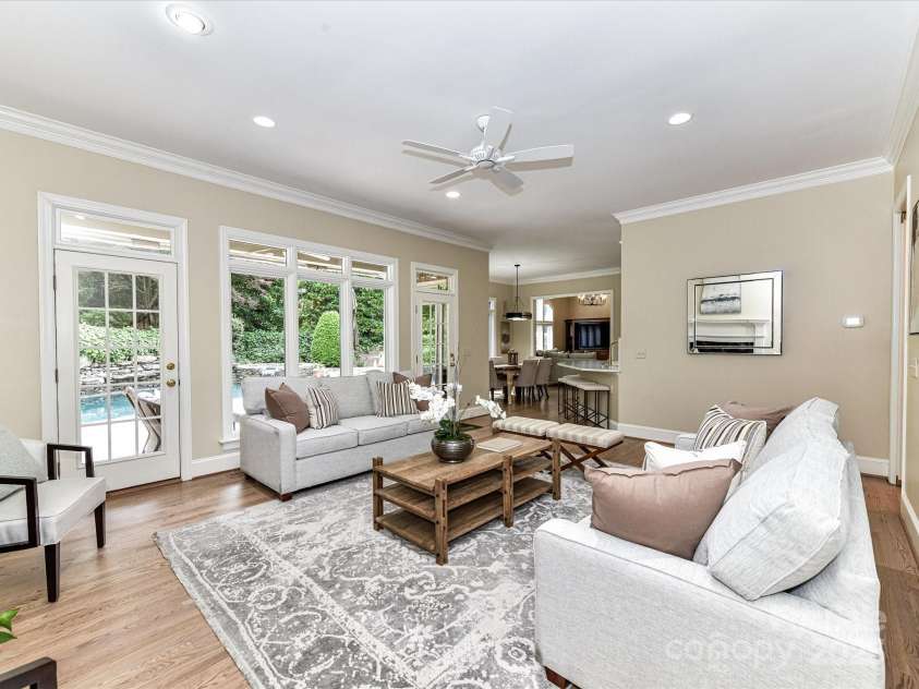 14650 Trading Path Way, Charlotte, NC 28277.  MLS# CAR4249159, YatesRealty ID 26743. Huge windows and french doors with views of the porch and pool