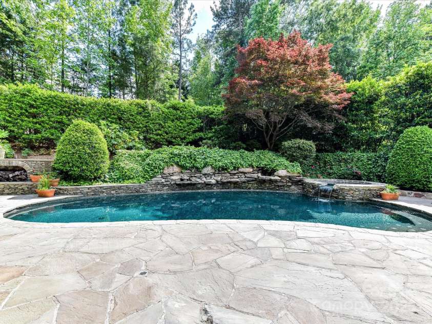14650 Trading Path Way, Charlotte, NC 28277.  MLS# CAR4249159, YatesRealty ID 26743. Pool with pebbletec interior in BlackGranite