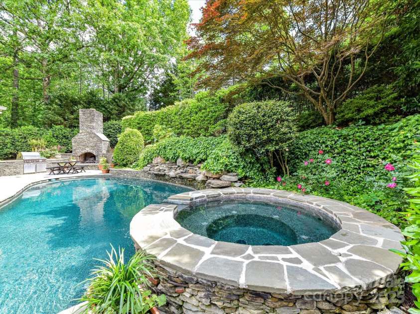 14650 Trading Path Way, Charlotte, NC 28277.  MLS# CAR4249159, YatesRealty ID 26743. Raised hot tub with spillover waterfall