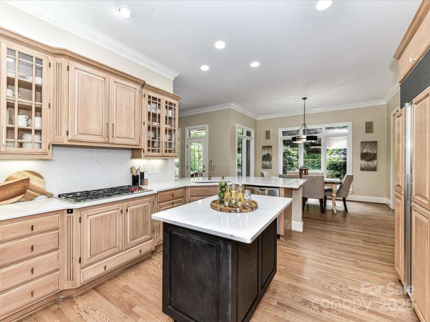 14650 Trading Path Way, Charlotte, NC 28277.  MLS# CAR4249159, YatesRealty ID 26743. Waterfall backsplash and counters in quartz