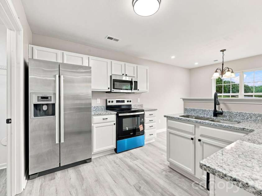 8207 Belmont Stables Drive, Charlotte, NC 28216.  MLS# CAR4409546, YatesRealty ID 26743. 
