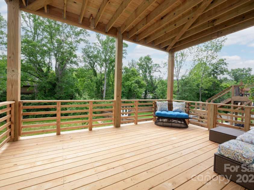 11 Middlebrook Road, Asheville, NC 28805.  MLS# CAR4259341, YatesRealty ID 26744. Covered, Lower-Level Deck Perfect for Grilling