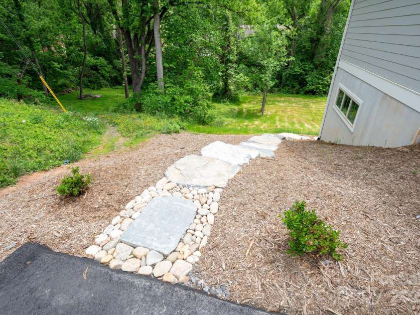 11 Middlebrook Road, Asheville, NC 28805.  MLS# CAR4259341, YatesRealty ID 26744. Professional Landscaping Includes Big-Boulder Steps and Stairs