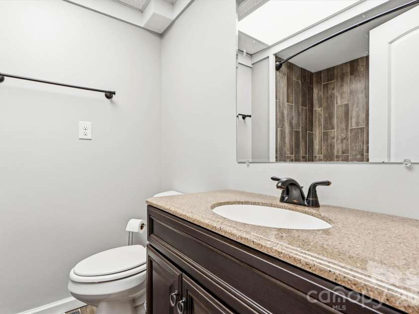 226 28th Avenue Place, Hickory, NC 28601.  MLS# CAR4386379, YatesRealty ID 26747. Basement Full Bath/Vanity View