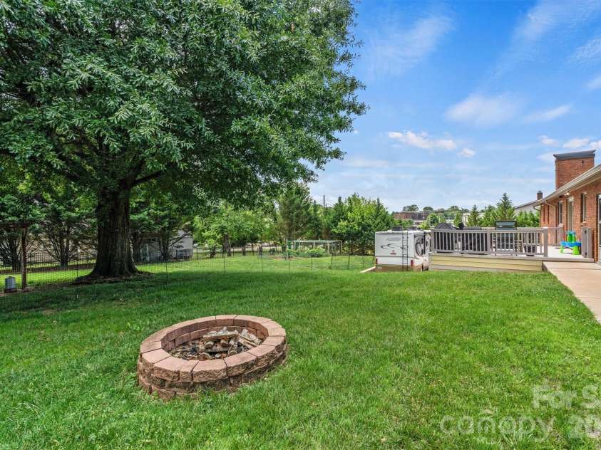 226 28th Avenue Place, Hickory, NC 28601.  MLS# CAR4386379, YatesRealty ID 26747. Focused Firepit/Back Yard View