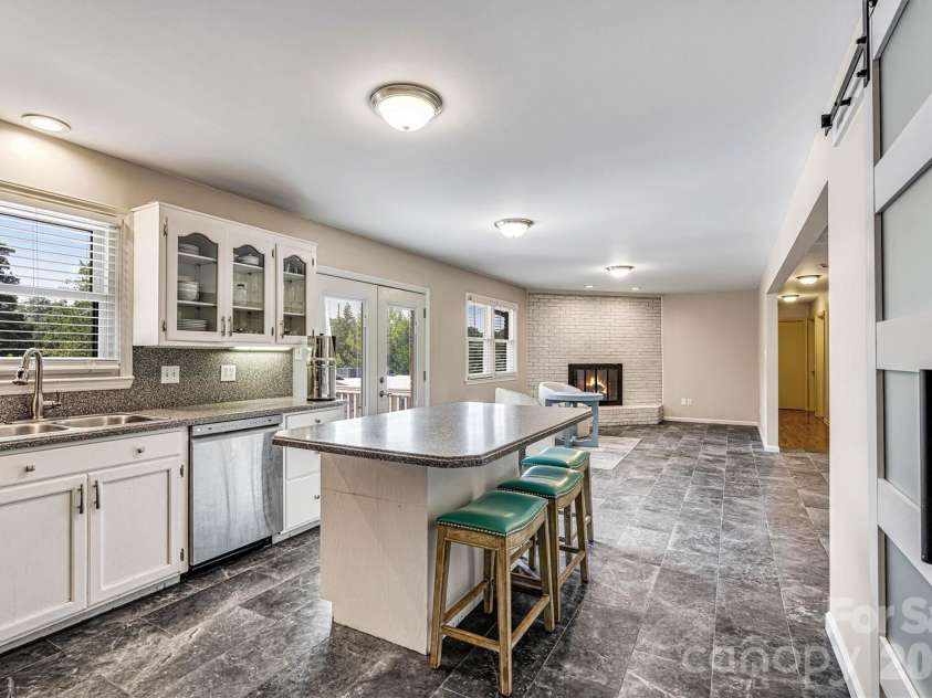 226 28th Avenue Place, Hickory, NC 28601.  MLS# CAR4386379, YatesRealty ID 26747. Focused Kitchen/Island View (New Tile Floor)