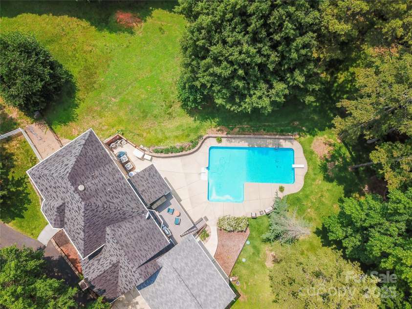 315 Red Barn Trail, Matthews, NC 28104.  MLS# CAR4267692, YatesRealty ID 26749. Aerial with pool
