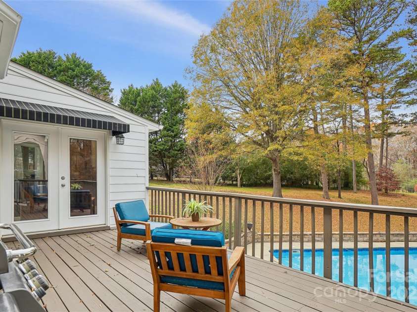 315 Red Barn Trail, Matthews, NC 28104.  MLS# CAR4267692, YatesRealty ID 26749. Upper deck overlooking pool and back yard
