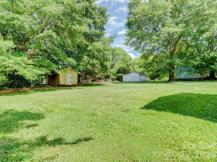 1707 David Drive, Shelby, NC 28150.  MLS# CAR4379907, YatesRealty ID 26750. Peaceful open back yard