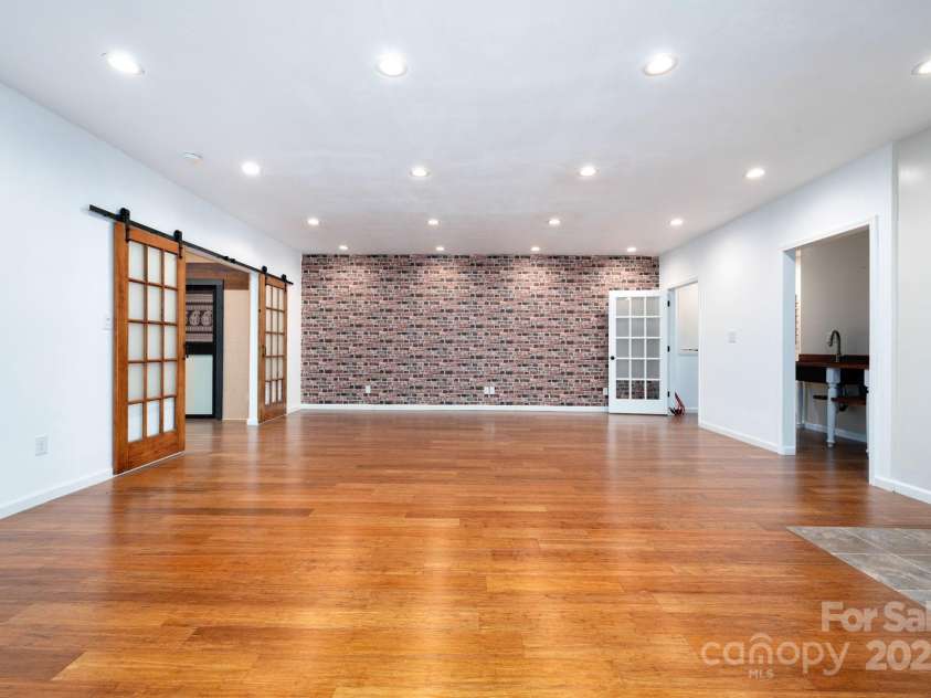 12 Asher Lane, Arden, NC 28704.  MLS# CAR4272445, YatesRealty ID 26758. Amazing Finished Basement Space