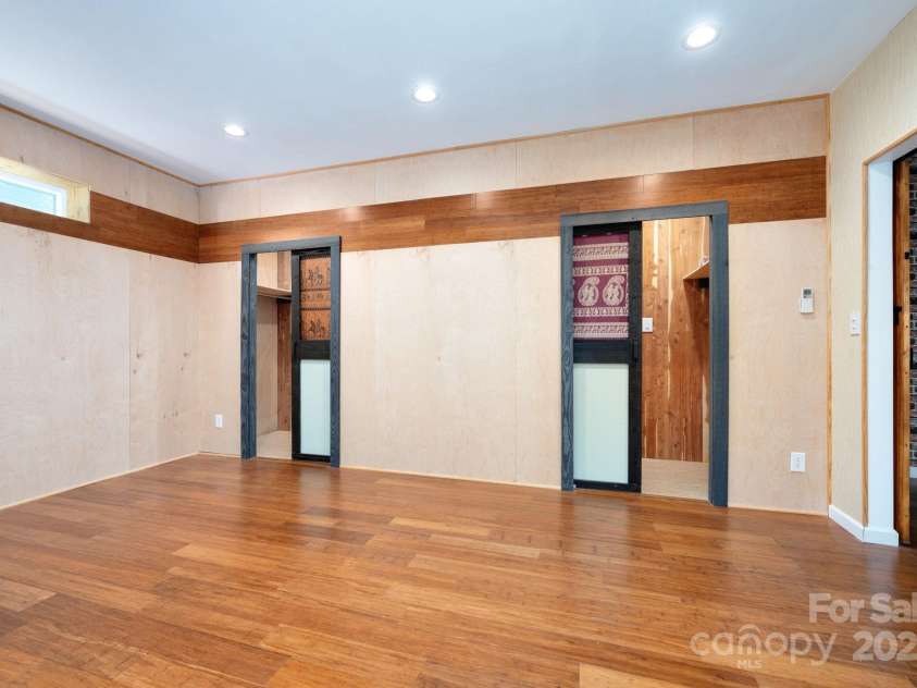 12 Asher Lane, Arden, NC 28704.  MLS# CAR4272445, YatesRealty ID 26758. Basement Flex Room or Fourth Bedroom