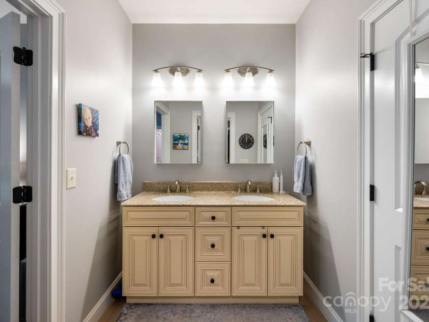 12 Asher Lane, Arden, NC 28704.  MLS# CAR4272445, YatesRealty ID 26758. Double Vanity In Ensuite Full Bathroom