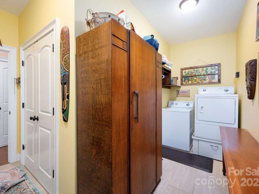 12 Asher Lane, Arden, NC 28704.  MLS# CAR4272445, YatesRealty ID 26758. Laundry On Main Level