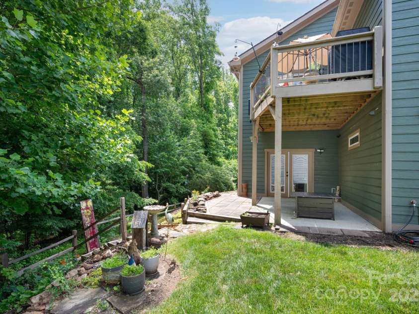 12 Asher Lane, Arden, NC 28704.  MLS# CAR4272445, YatesRealty ID 26758. Mature Trees Provide Pleasant Privacy