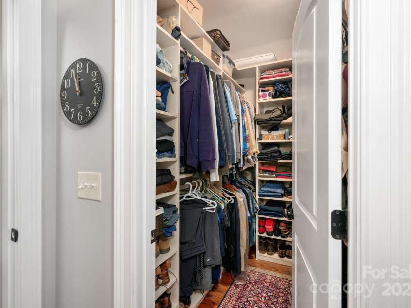 12 Asher Lane, Arden, NC 28704.  MLS# CAR4272445, YatesRealty ID 26758. Walk-In Closet with Built-In Organization