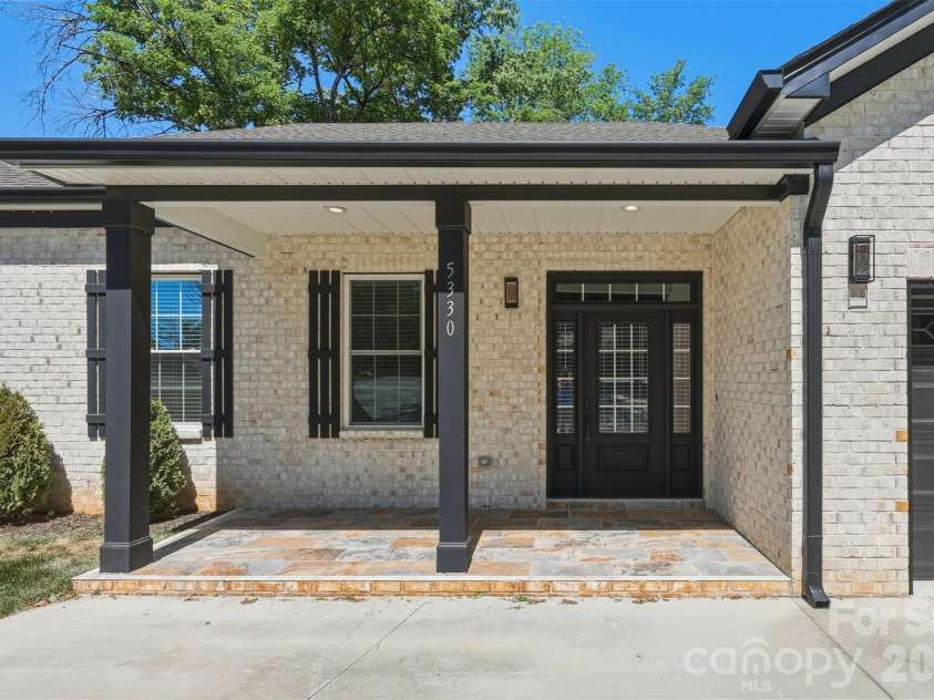 5330 Tuckaseegee Road, Charlotte, NC 28208.  MLS# CAR4372285, YatesRealty ID 26761. Front porch