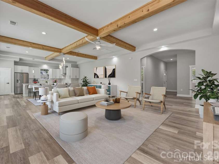 5330 Tuckaseegee Road, Charlotte, NC 28208.  MLS# CAR4372285, YatesRealty ID 26761. Living room virtually staged