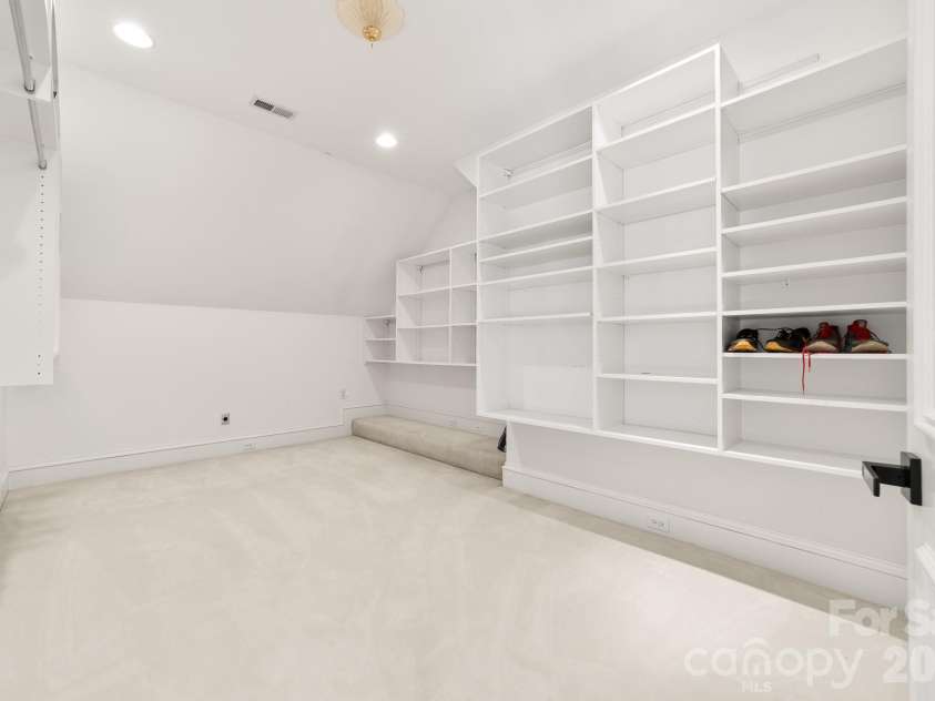 18212 Pompano Place, Cornelius, NC 28031.  MLS# CAR4365498, YatesRealty ID 26767. Upper-Level Storage Closet