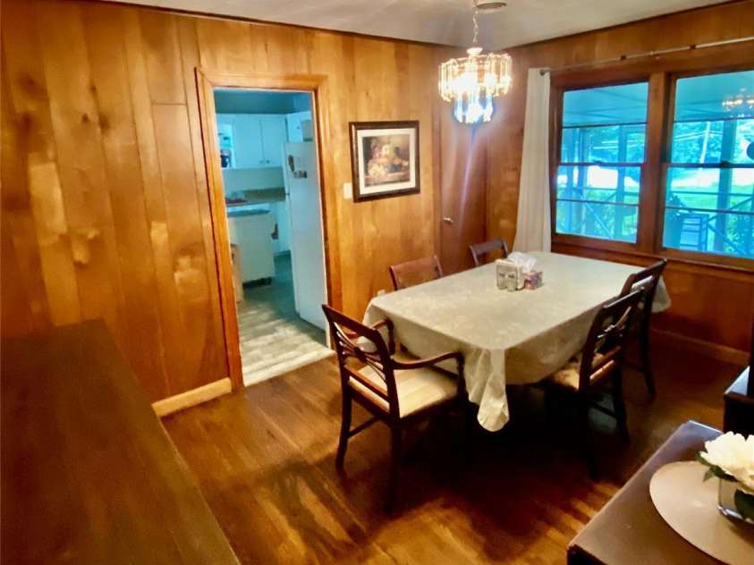 3702 Crawford Street, Gastonia, NC 28052.  MLS# CAR4275636, YatesRealty ID 26767. Beautiful Dining Room overlooking spacious screen room.