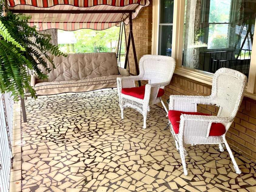 3702 Crawford Street, Gastonia, NC 28052.  MLS# CAR4275636, YatesRealty ID 26767. Picture window with side windows from living room with front porch and front yard view.