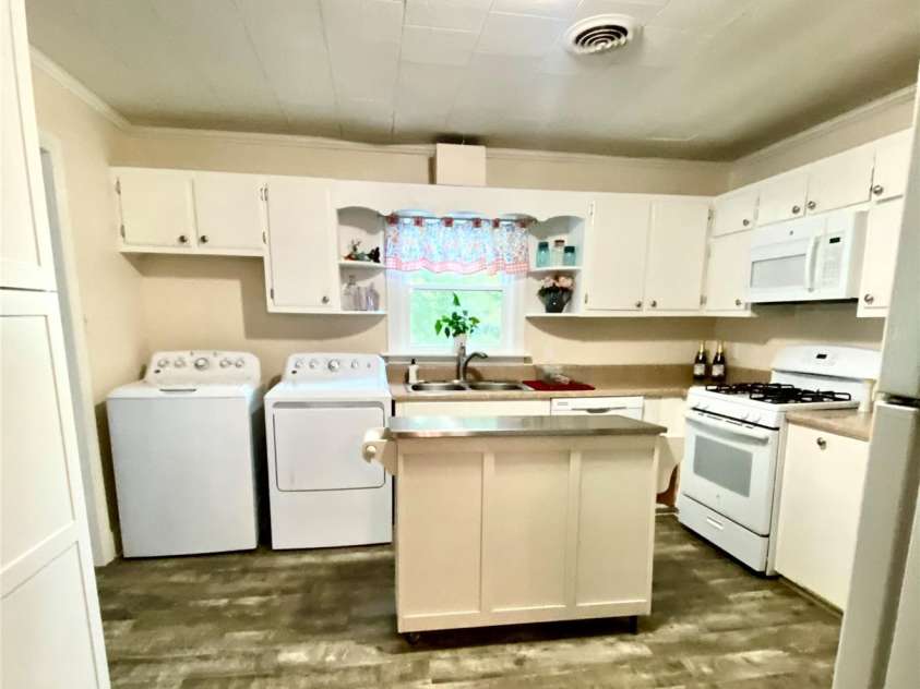 3702 Crawford Street, Gastonia, NC 28052.  MLS# CAR4275636, YatesRealty ID 26767. Quaint Kitchen with Luxury Vinyl Planking.