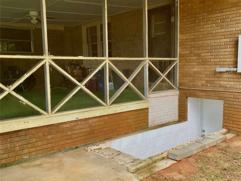 3702 Crawford Street, Gastonia, NC 28052.  MLS# CAR4275636, YatesRealty ID 26767. Staircase/Steps to basement.