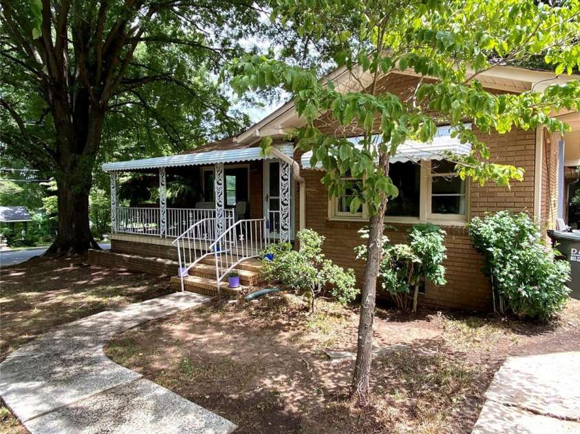 3702 Crawford Street, Gastonia, NC 28052.  MLS# CAR4275636, YatesRealty ID 26767. Walkway to home and driveway freshly pressure washed.