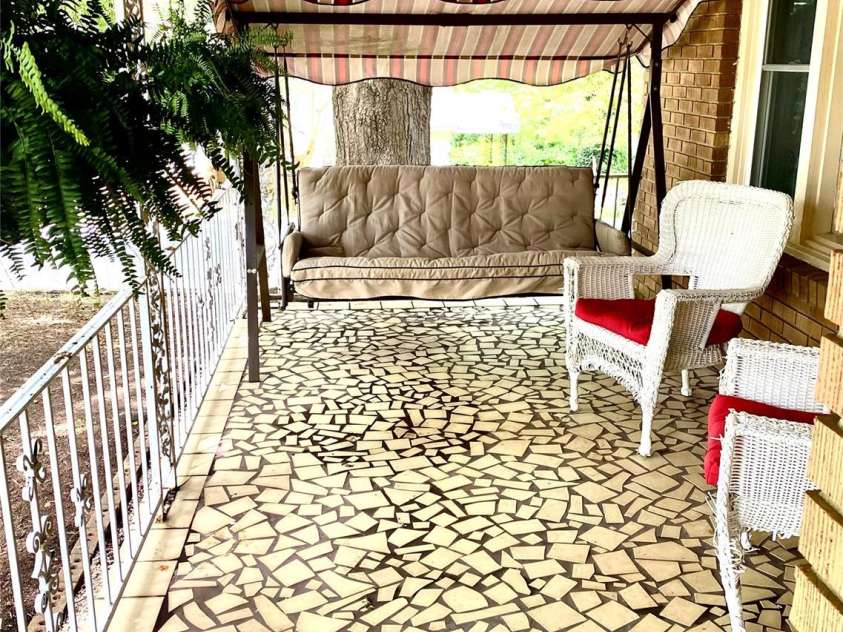 3702 Crawford Street, Gastonia, NC 28052.  MLS# CAR4275636, YatesRealty ID 26767. Welcoming rocking chair porch to sit, relax & enjoy!