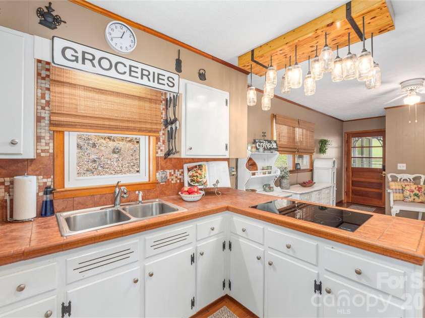 63 Memory Drive, Waynesville, NC 28786.  MLS# CAR4364829, YatesRealty ID 26768. 