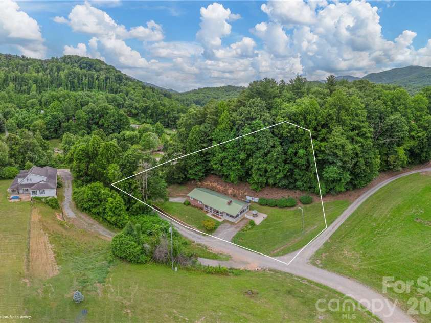63 Memory Drive, Waynesville, NC 28786.  MLS# CAR4364829, YatesRealty ID 26768. 