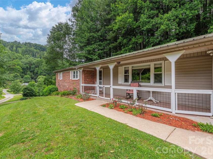 63 Memory Drive, Waynesville, NC 28786.  MLS# CAR4364829, YatesRealty ID 26768. 