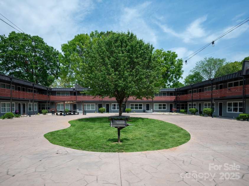 2000 Patio Court, Charlotte, NC 28205.  MLS# CAR4270954, YatesRealty ID 2677. Grill area is perfect for a Panthers tailgate and corn hole