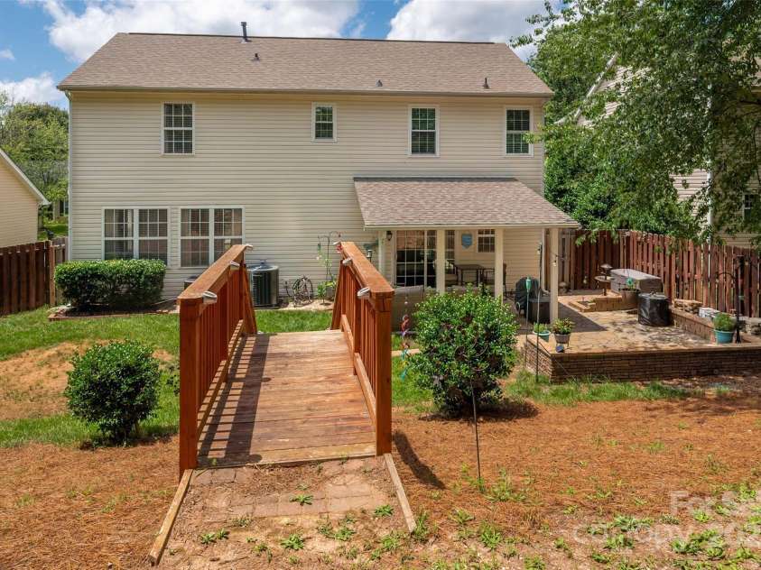 6422 Gatesville Lane, Charlotte, NC 28270.  MLS# CAR4274062, YatesRealty ID 26773. Backyard Stairs