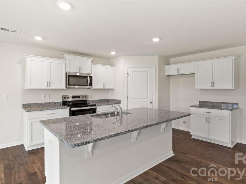 76 Creekwalk Lane, Waynesville, NC 28785.  MLS# CAR4339935, YatesRealty ID 2678. Photos are representative