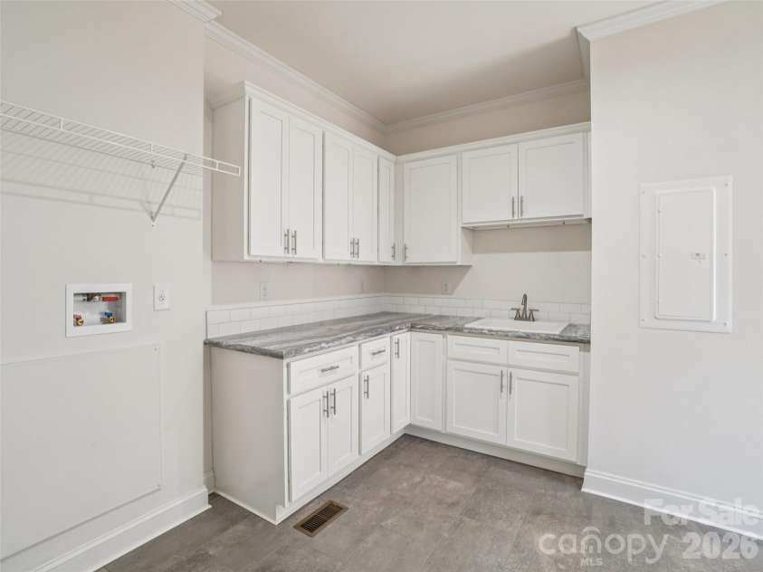 56 Big Branch Drive, Mars Hill, NC 28754.  MLS# CAR4347159, YatesRealty ID 26785. Laundry Room
