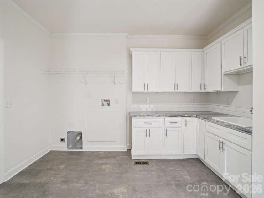 56 Big Branch Drive, Mars Hill, NC 28754.  MLS# CAR4347159, YatesRealty ID 26785. Laundry Room