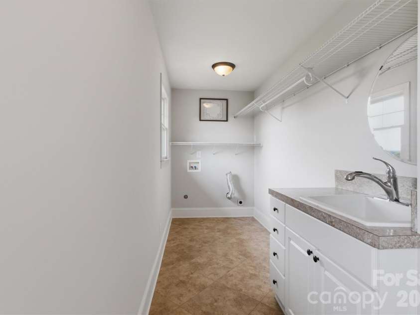 4712 Secrest Shortcut Road, Monroe, NC 28110.  MLS# CAR4381520, YatesRealty ID 26787. Laundry